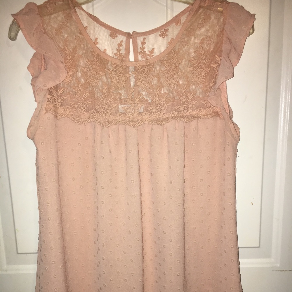 Size medium mine blouse with lace.